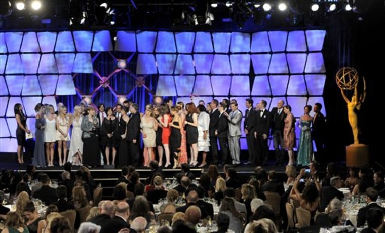 The cast and crew of \"General Hospital\" accept the award for drama series onstage Saturday at the 39th Annual Daytime Emmy Awards at the Beverly Hilton Hotel.